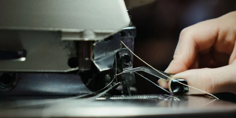Detailed close-up of a sewing machine in use
