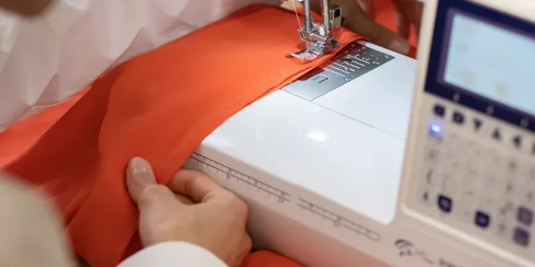 Brother sewing machine with orange fabric