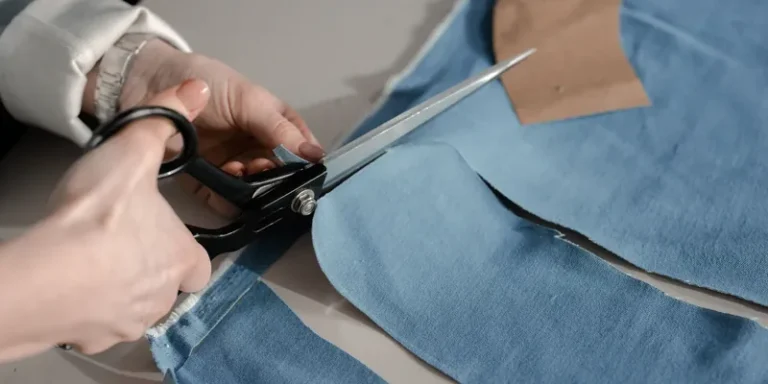 Cutting denim with tailor shears
