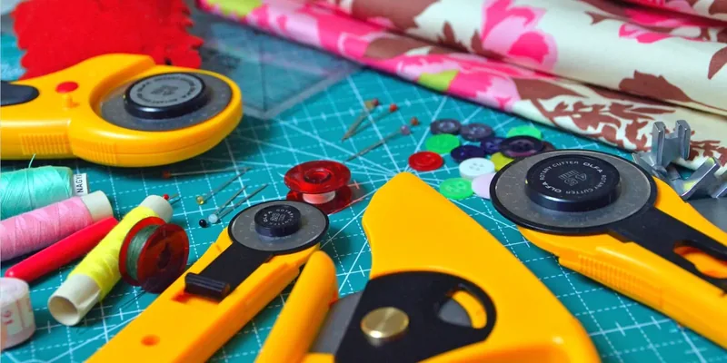 Colorful sewing supplies on a cutting mat