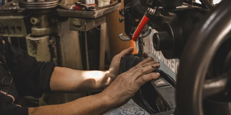 Sewing machine maintenance with oil