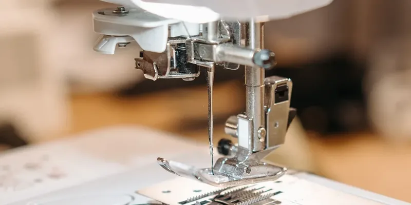 Close-up of a needle plate and presser foot