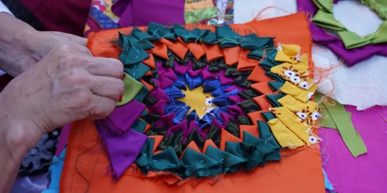 Handwork on a colorful patchwork block