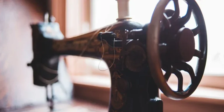 Close-up of an antique sewing machine with detailed craftsmanship